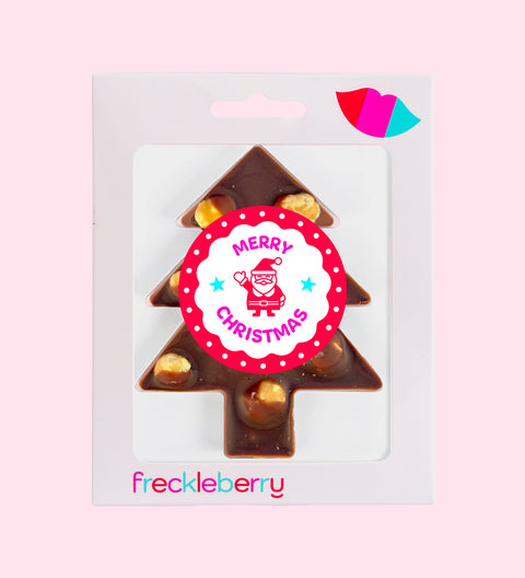 Creamy premium Belgian chocolate (available in 3 variants - dark, milk or white) tree-shape loaded with roasted hazelnuts, gooey caramel, and a sprinkle of sea salt with "Merry Christmas - Santa" label/design for a festive indulgence.
