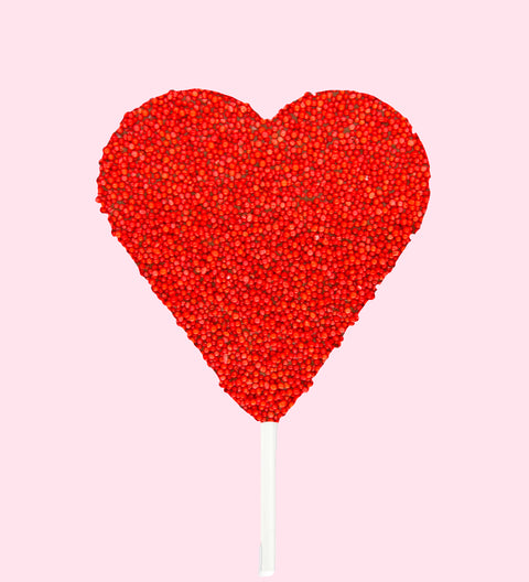 Creamy Belgian chocolate (available in 3 variants - dark, milk or white) heart topped with vibrant red sprinkles, perfect for a fun and unique treat.