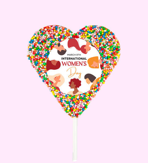 Creamy Belgian chocolate heart pop (available in 3 variants - dark, milk or white) covered in colourful sprinkles with "March 8th International Women's Day" label/design, a sweet way to celebrate and empower women.