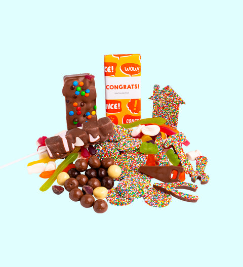 Luxury 'New Home - Congratulations' Chocolate Hamper
1 x Luxury Gloss White Hamper Gift Box
1 x Chocolate Tools/Sold Word - Milk Chocolate
1 x Milk Chocolate Freckle House
1 x 200g Milk Chocolate Freckles
1 x 200g Mixed Chocolate Raspberries
1 x 200g Lolly Jumble
1 x Fun Rocky Road
1 x Premium Belgian Milk Chocolate 'Congrats' Block
1 x Mallow Pop
1 x Option to Add: 'Congrats to You' Message on Hamper