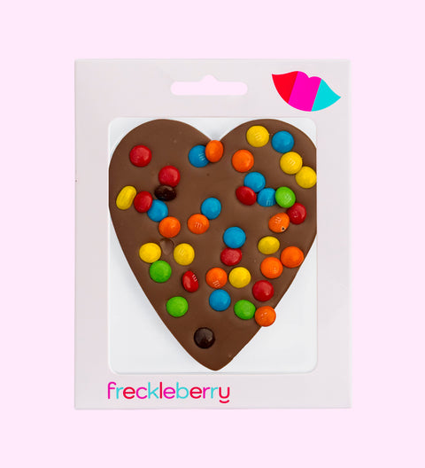 Creamy Belgian milk chocolate heart topped with colourful M&M® s, perfect for gifting or treating yourself.