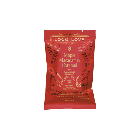 Red packaging of Loco Love Maple Macadamia Caramel with Tasmanian Sea Salt on a white background