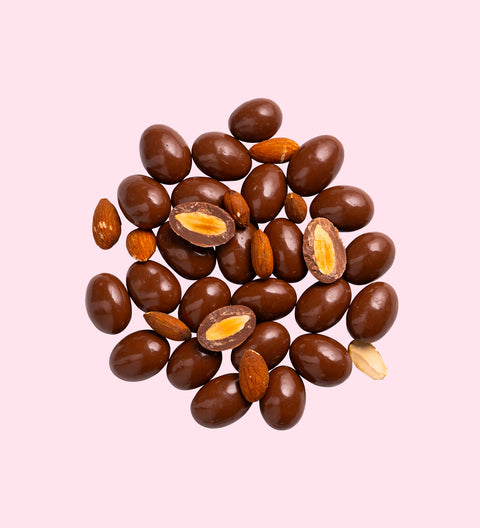 Crunchy roasted almonds covered in smooth Belgian milk chocolate, perfect for festive gifting or snacking.