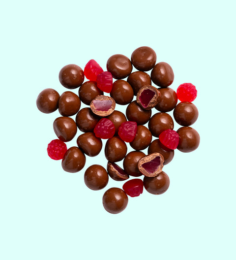 Tangy raspberries covered in smooth premium Belgian milk chocolate, a decadent and fruity festive treat.