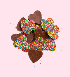 Creamy Belgian milk chocolate freckles shaped like hearts
