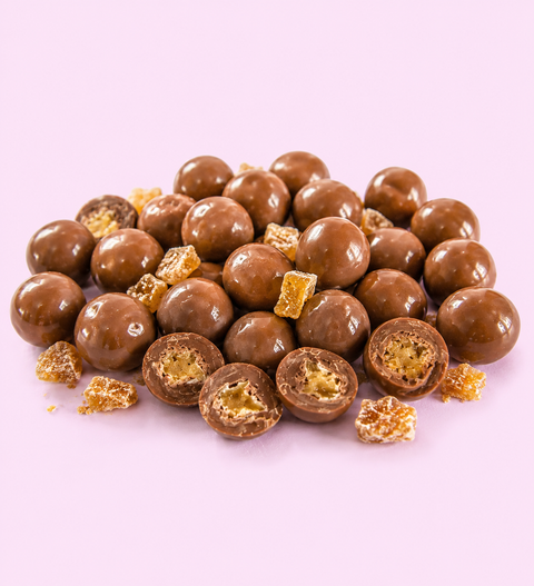 Candied ginger coated with milk chocolate