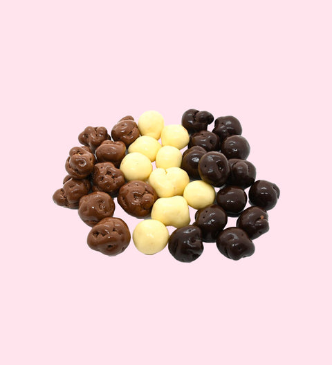 Crunchy caramel popcorn coated in dark, milk, and white Belgian chocolate for the ultimate sweet snack.