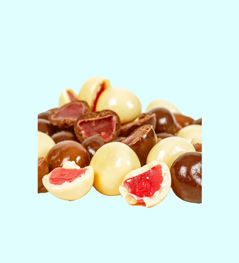 Tangy raspberries covered in smooth milk, creamy white, and rich dark premium Belgian chocolate – a decadent fruity treat.