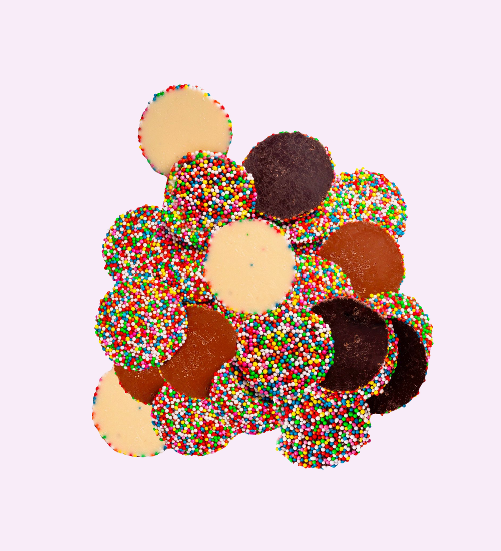 Mixed Milk Chocolate Freckles, made from smooth premium Belgian chocolate and topped with colourful sprinkles – a fun and tasty treat for any occasion.