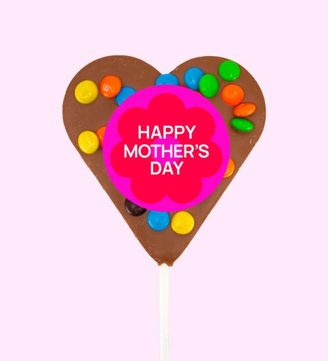 Creamy Belgian chocolate (available in 3 variants - dark, milk or white) heart pop topped with colourful M&M®s wrapped with "Happy Mother's Day" label/design - the perfect sweet gift to show Mum your love.