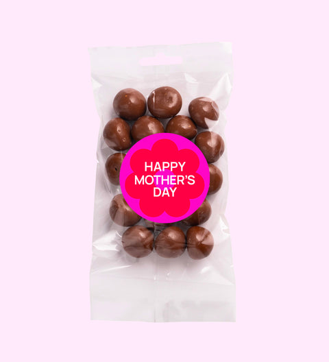 Tangy and juicy raspberries covered in smooth premium Belgian milk chocolate with Happy Mother's Day sticker, a decadent and fruity Mother’s Day treat.