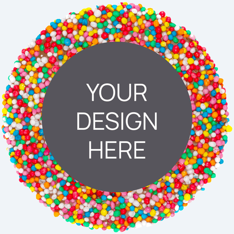A custom product featuring a single round confectionery item with a colorful sprinkled border and a blank space in the center for a custom label, displayed alongside a selection of other colored sprinkles.