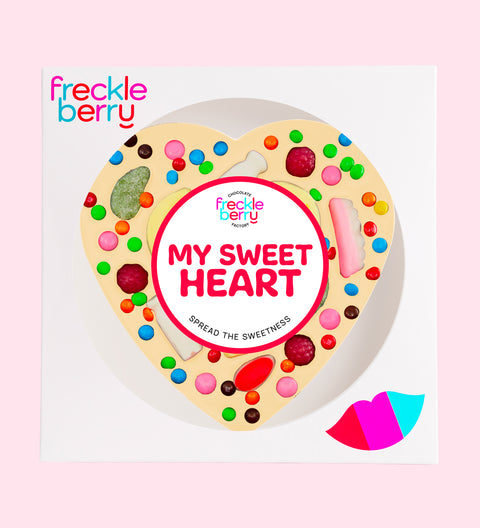 Premium giant creamy Belgian white chocolate heart topped with lollies with "My Sweet Heart" design/label -  perfect for sharing love with a fun, sweet treat.