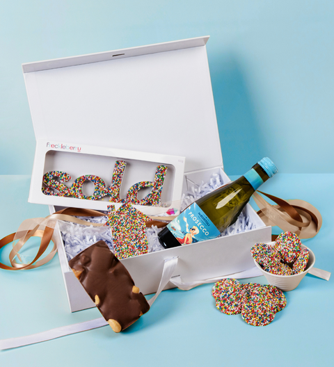 Carefully curated hamper which includes Belgian chocolate Freckle House, “SOLD” freckle, rocky road, freckles & a celebration drink — beautifully boxed. Handcrafted in Geelong.