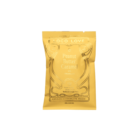 Gold packaging of Loco Love Peanut Butter Caramel on a black background