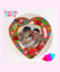 Premium Belgian chocolate heart pizza (available in 3 variants - dark, milk or white) topped with colourful lollies, customised with your uploaded image for a fun and unique gift.