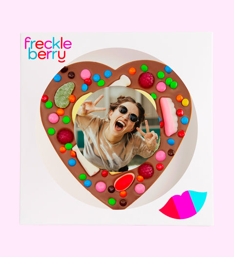 Premium Belgian chocolate heart pizza (available in 3 variants - dark, milk or white) topped with colourful lollies, customised with your uploaded image for a fun and unique gift.