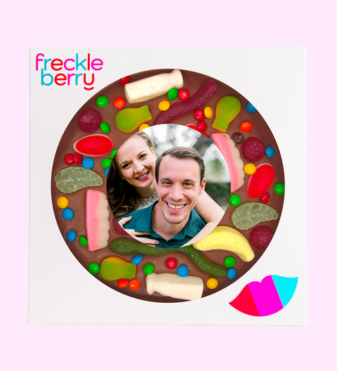 Premium Belgian chocolate pizza (available in 3 variants - dark, milk or white) topped with colourful lollies, customised with your uploaded image for a fun and unique gift.
