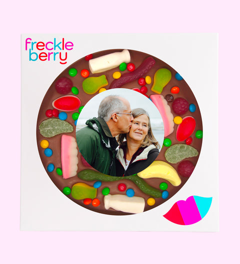 Premium Belgian chocolate pizza (available in 3 variants - dark, milk or white) topped with colourful lollies, customised with your uploaded image for a fun and unique gift.