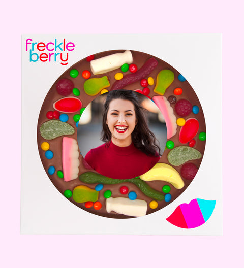 Premium Belgian chocolate pizza (available in 3 variants - dark, milk or white) topped with colourful lollies, customised with your uploaded image for a fun and unique gift.