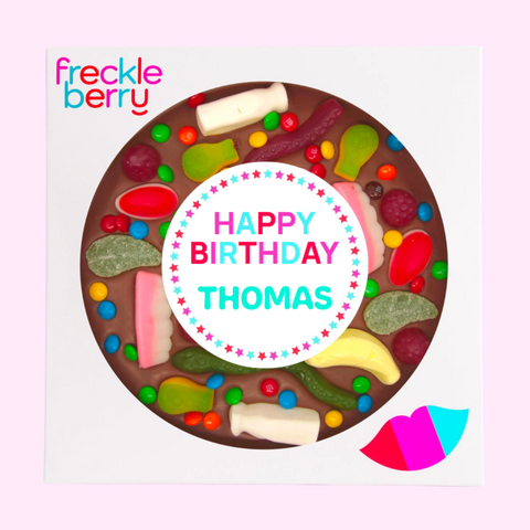 Premium Belgian chocolate pizza (available in 3 variants - dark, milk or white) topped with colourful lollies, customised with a name for the perfect celebration.