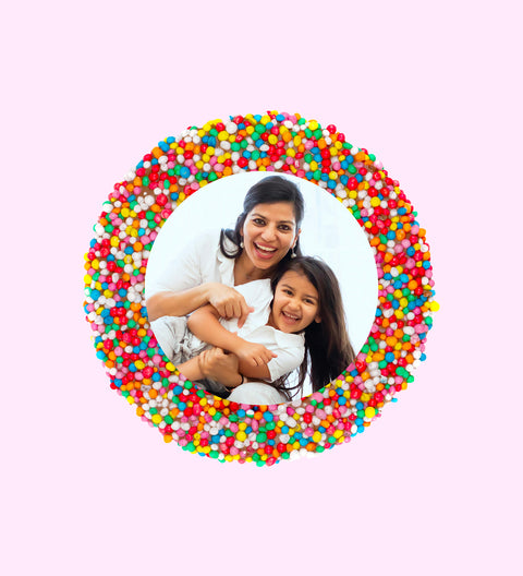 Creamy Belgian chocolate (available in 3 variants - dark, milk or white) topped with colourful sprinkles, customised with your uploaded image for a unique and thoughtful gift.