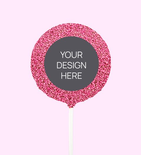 Creamy Belgian chocolate (available in 3 variants - dark, milk or white) round pop covered in colourful pink sprinkles, customised with your uploaded design for a unique and thoughtful gift.