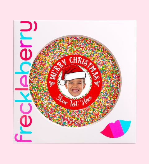 Creamy giant Belgian chocolate (available in 3 variants - dark, milk or white) topped with colourful sprinkles, customised with a festive Santa hat design for holiday gifting.