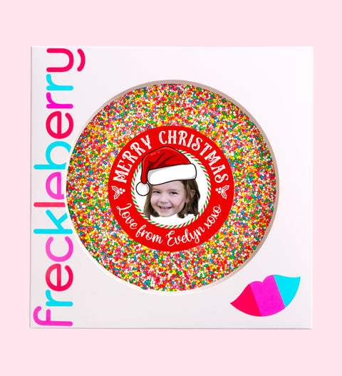 Creamy giant Belgian chocolate (available in 3 variants - dark, milk or white) topped with colourful sprinkles, customised with a festive Santa hat design for holiday gifting.