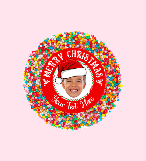 Creamy Belgian chocolate (available in 3 variants - dark, milk or white) topped with colourful sprinkles, customised with a festive Santa hat design for holiday gifting.