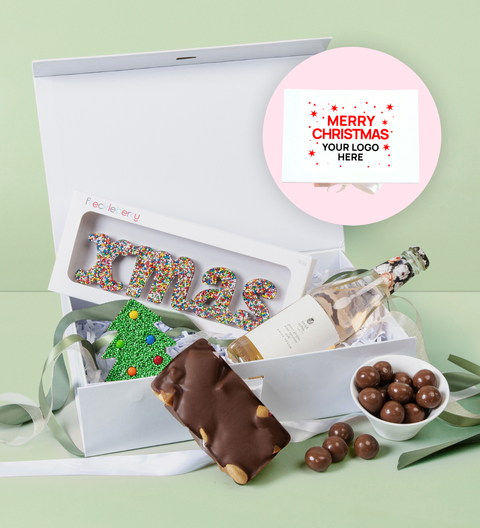 An indulgent selection of premium Belgian chocolates and a choice of celebration drink, customised for festive gifting and holiday cheer.