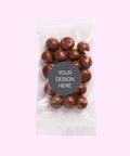 Filled with delicious milk chocolate coated raspberries, customised with your uploaded design for the perfect party favour or corporate gift.