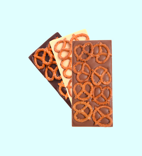 Premium Belgian chocolate blocks with crunchy salted pretzels available in 3 flavours (white, dark and milk), perfect for gifting.