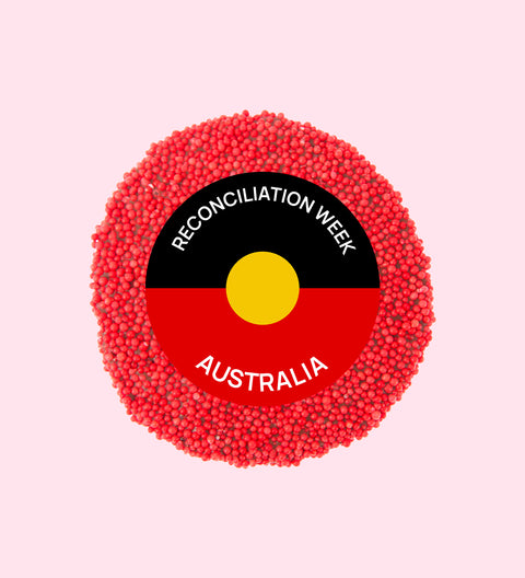 Creamy Belgian chocolate (available in 3 variants - dark, milk or white) topped with vibrant red sprinkles - a sweet way to honour and support Reconciliation Week.