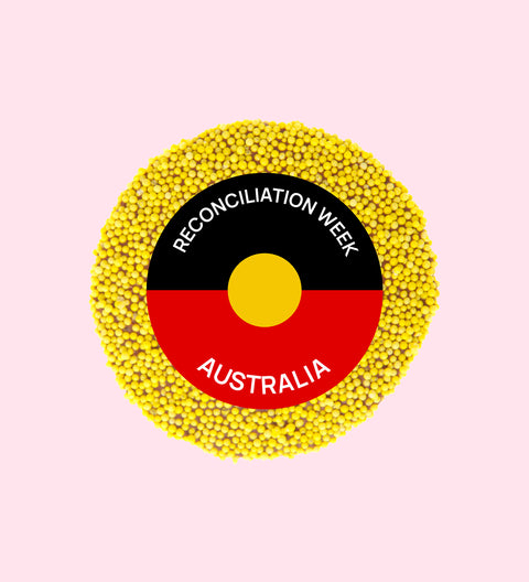 Creamy Belgian chocolate (available in 3 variants - dark, milk or white) topped with vibrant yellow sprinkles - a sweet way to honour and support Reconciliation Week.