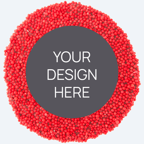 A custom product featuring a single round confectionery item with a colorful sprinkled border and a blank space in the center for a custom label, displayed alongside a selection of other colored sprinkles.