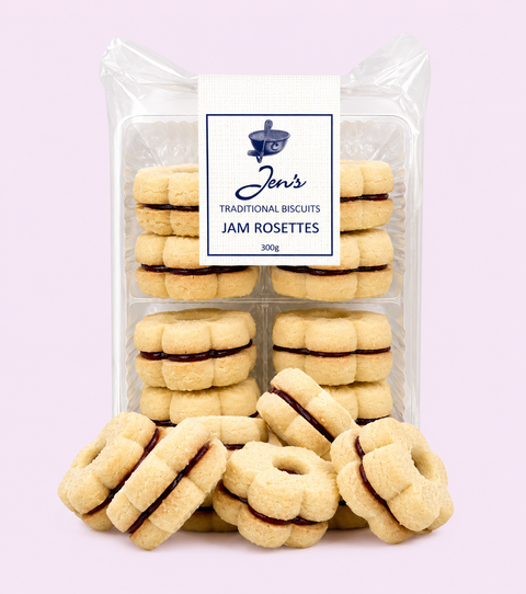 A package of Jen's Traditional Biscuits Jam Rosettes, showing a clear plastic bag with a white label and several cookies in front on a light lavender background.
