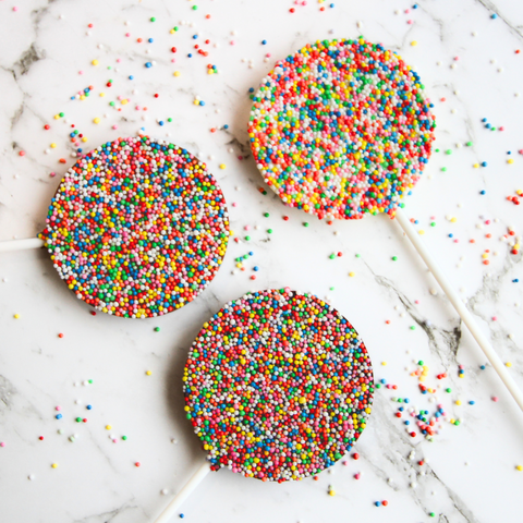 Premium Belgian chocolate pop topped with colourful sprinkles – a fun and tasty treat for any occasion.