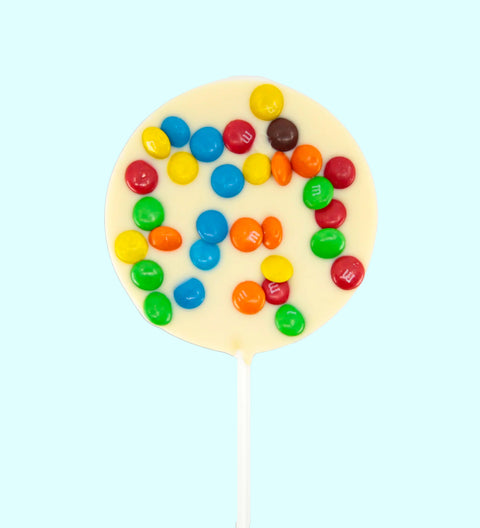 Creamy Belgian white chocolate pop topped with colourful M&M®s - a fun and tasty way to celebrate special occasions.
