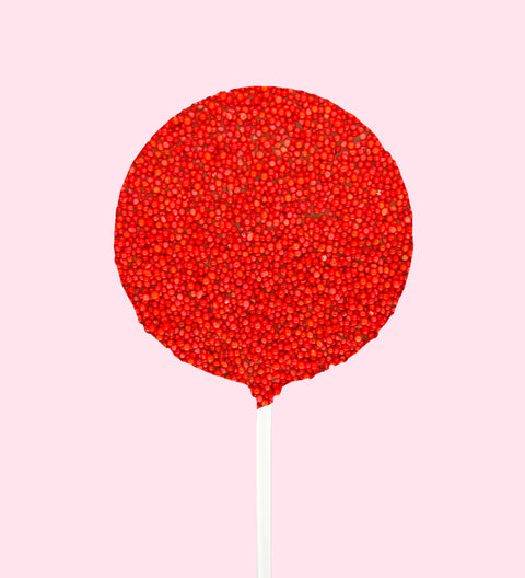 Creamy Belgian chocolate (available in 3 variants - dark, milk or white) pop topped with vibrant red sprinkles, perfect for a fun and unique treat.