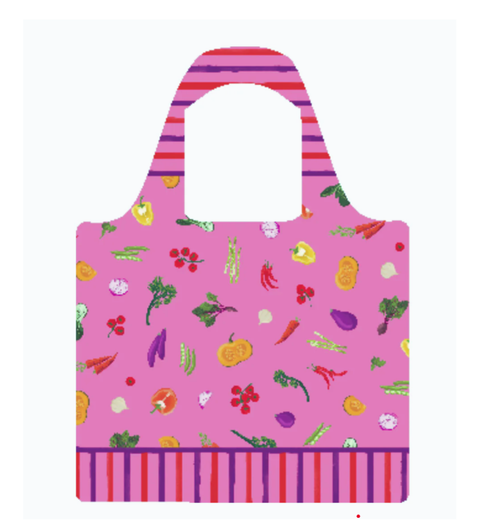 Reusable shopping bag with vegetable pattern on a pink background.
