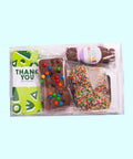 Thank You Gift Box, filled with a selection of premium Belgian chocolate treats – a delicious way to say thanks. Inclusions:

100g Milk Chocolate Message Block
150g Fun Rocky Road
150g Milk Chocolate Speckles Grab Bag
60g Marshmallow Pop
60g Chocolate “Thanks” Word
