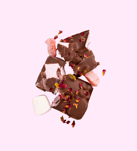 Smashed Turkish Delight Rocky Road packed with soft marshmallows, crunchy nuts, and sweet Turkish delight, all coated in smooth premium Belgian milk chocolate.
