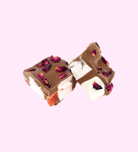 Sliced Turkish Delight Rocky Road packed with soft marshmallows, crunchy nuts, and sweet Turkish delight, all coated in smooth premium Belgian milk chocolate.
