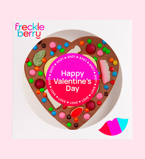 Premium giant Belgian milk chocolate topped with colourful lollies and wrapped in a cheerful "Happy Valentine's Day" design/label – a fun and delicious gift for someone special.