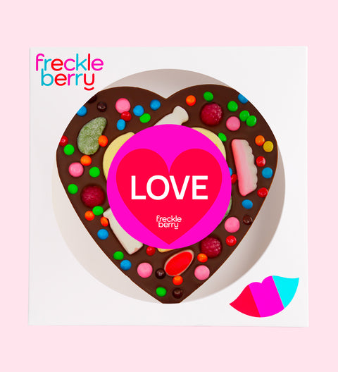 Premium giant Belgian dark chocolate topped with colourful lollies and wrapped in a cheerful "Love" design/label – a fun and delicious gift for someone special.