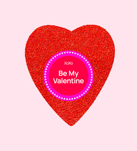 Giant red freckle heart, made from premium Belgian chocolate and topped with vibrant red sprinkles wrapped in a Happy Valentine’s Day design (with Be My Valentine sticker) for the perfect romantic treat.