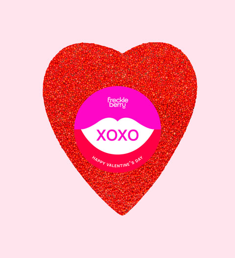 Giant red freckle heart, made from premium Belgian chocolate and topped with vibrant red sprinkles wrapped in a Happy Valentine’s Day design (with XOXO sticker) for the perfect romantic treat.