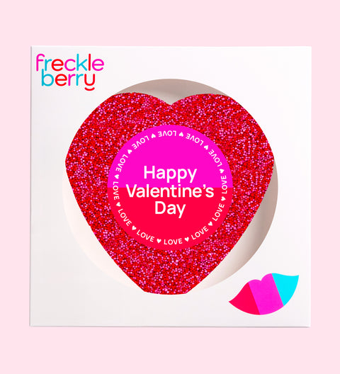 Premium giant Belgian chocolate heart (avaialble in 3 variants - dark, milk and white) topped with vibrant red and pink sprinkles wrapped in "Happy Valentine's Day" label/design for the perfect romantic treat.