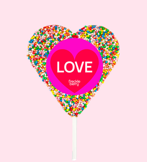 Creamy Belgian chocolate heart (available in 3 variants - dark, milk or white) covered in colourful multi sprinkles with "Love" design/label - the perfect sweet gift to say “I love you.”